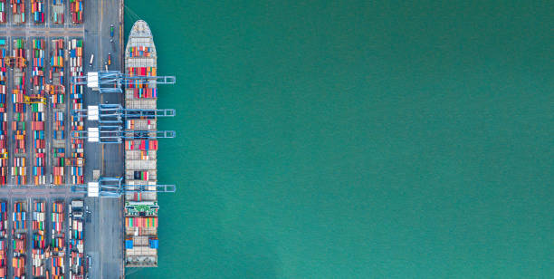 istock Container ship carrying container for import and export, business logistic and transportation by ship in open sea, Aerial view container ship with copy space. 1162893661