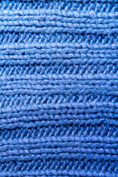 istock blue rib or cable stitch knitted woolen background 1162895887