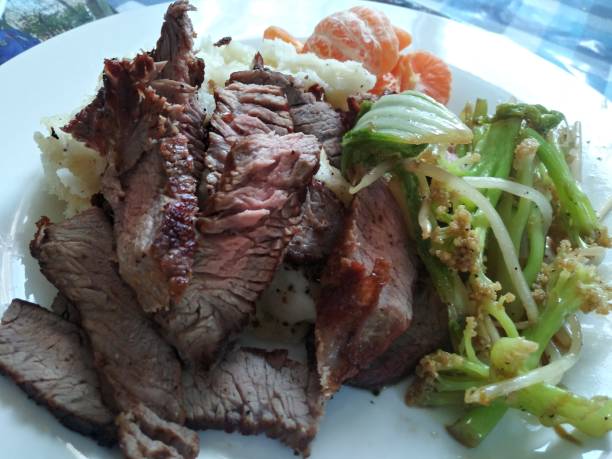 istock slices steak with veggies and mashpotato 1162896995