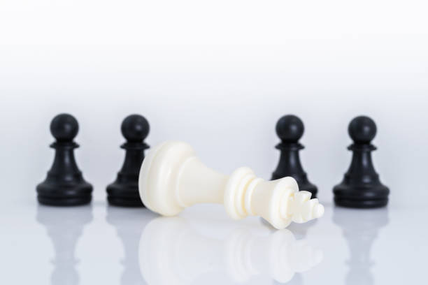 istock black and white chess pieces on chessboard, 1162899460