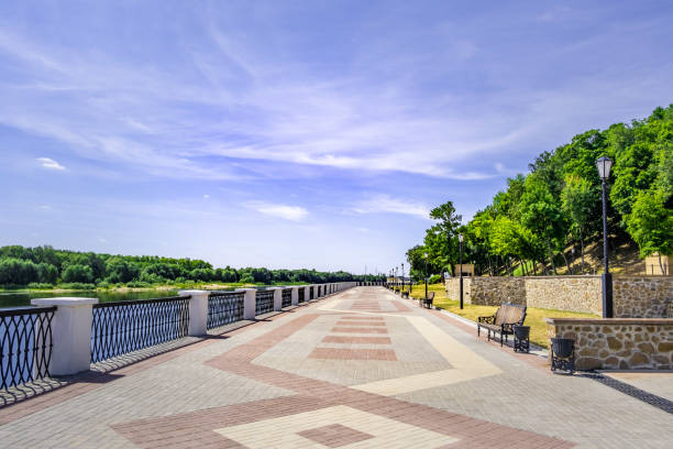 istock Beautiful paved walkway along Sozh river in Gomel, Belarus 1162901524