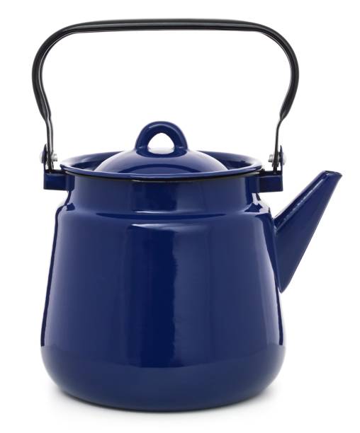 istock Blue retro enameled kettle on a white background 1162903066