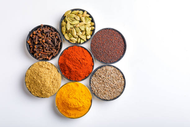 istock Various spices in a bowls on white background. Top view with copy space. 1162904252