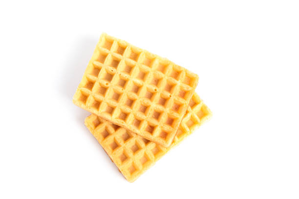 istock Sweet Belgian waffles isolated on white background 1162904542