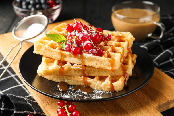 istock Beautiful composition with sweet waffles, closeup 1162904768