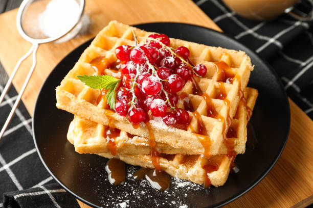 istock Beautiful composition with sweet waffles, closeup 1162905289