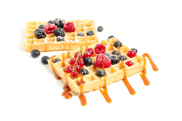 istock Waffles under caramel topping isolated on white background 1162905341