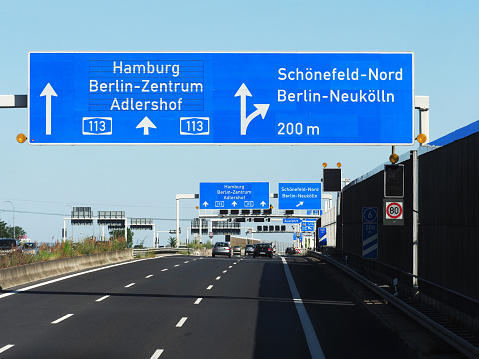 Germany, autobahn, traffic. Road to the center of Berlin, Hamburg, road signs