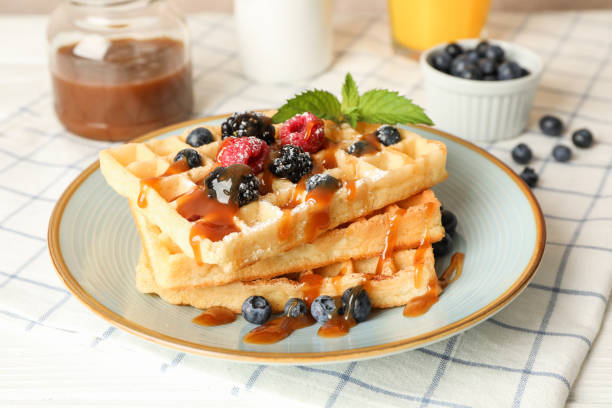 istock Composition of breakfast with belgian waffles, space for text 1162905725