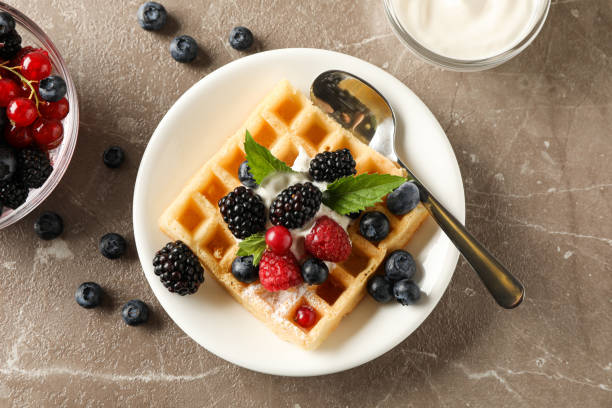 istock Composition of breakfast with belgian waffles, top view 1162906384