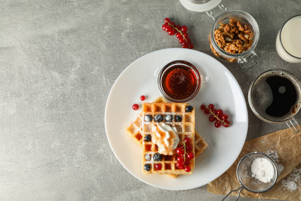 istock Composition of breakfast with belgian waffles, top view 1162906397