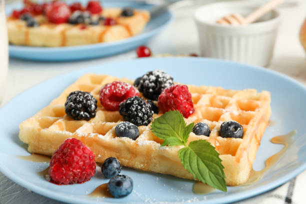 istock Composition of breakfast with belgian waffles, space for text 1162906548