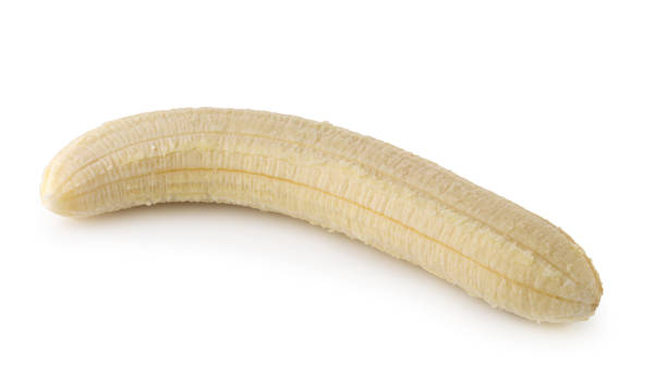 istock Peeled banana slices isolated over a white background. 1162909926