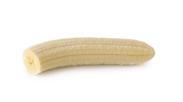 istock Peeled banana slices isolated over a white background. 1162909927
