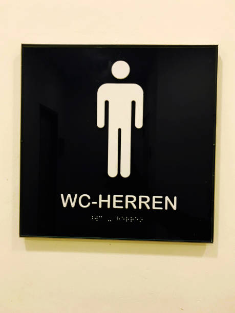 istock The gents' room with braille (in German language) 1162910062
