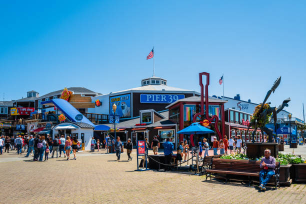 Pier 39 and Fisherman's Wharf in San Francisco, California, USA San Francisco, California, USA - July 3 2019: Pier 39 is a famous tourist spot in San Francisco area and usually crowded in the weekend. fishermans wharf san francisco photos stock pictures, royalty-free photos & images