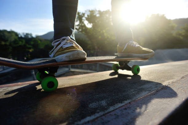 istock Skateboarder skateboarding on skate park 1162921955