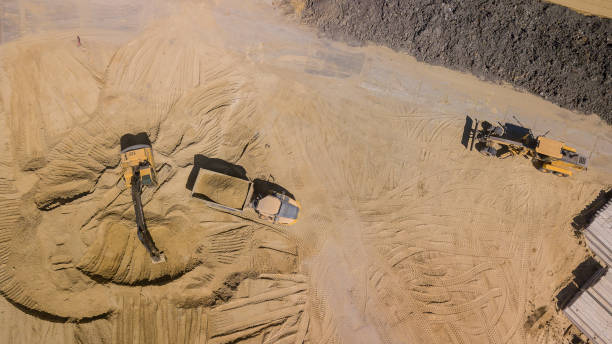 istock Top view of excavator working in construction site. 1162924171