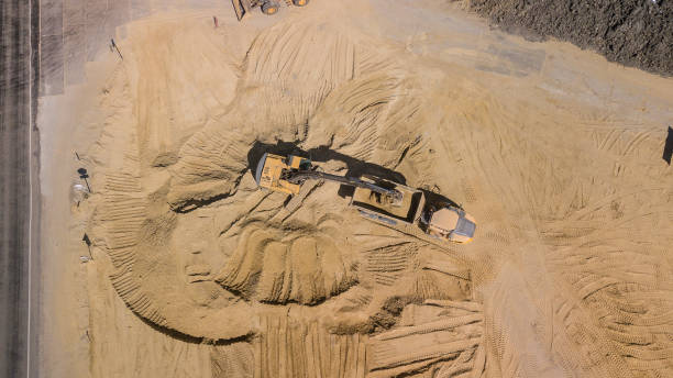 istock Top view of excavator working in construction site. 1162924292
