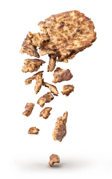 istock Fried cutlet broken into pieces isolated on a white background 1162926928