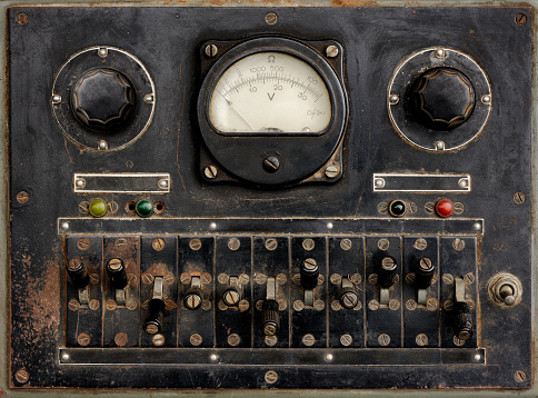 Backgrounds and textures: very old control panel with switches, lamps, indicators, scals and dials