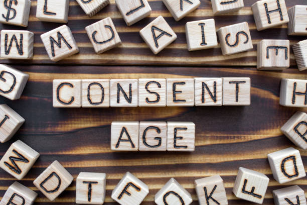 istock consent age wooden cubes with letters 1162929233