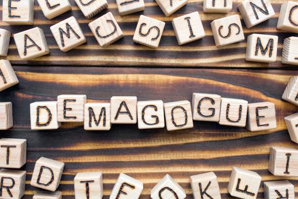 istock demagogue wooden cubes 1162929343
