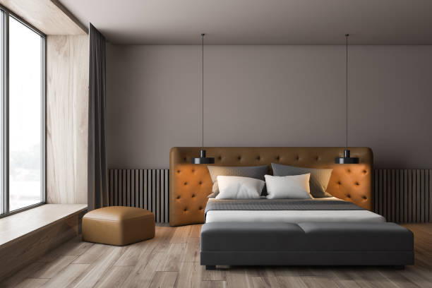 istock Brown bedroom interior with leather bed 1162930709