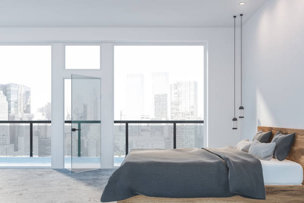 istock White bedroom interior with balcony 1162931446