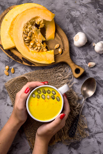 istock Traditional Autumn Pumpkin Dish - Soup with Spices and Garlic 1162931663