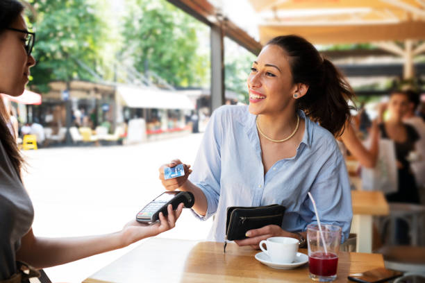istock Woman making card payment. 1162932764