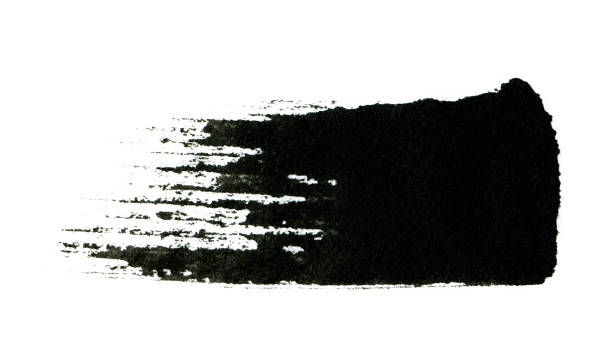 istock Black color paint with brush stroke isolated on white background 1162933066