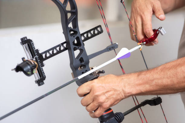 istock Archer hands close up, preparing the arrow for the shot. 1162933982