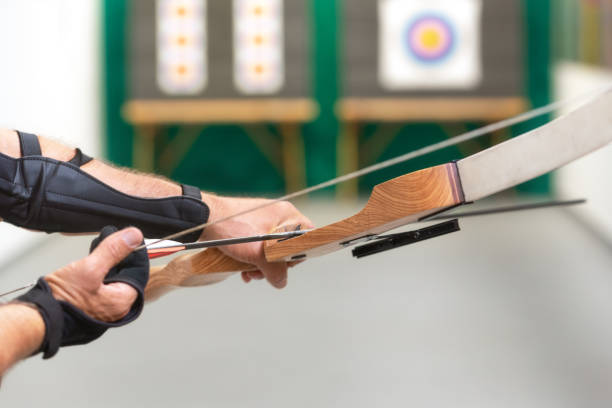 istock Archer hands close up, preparing the arrow for the shot. 1162934017