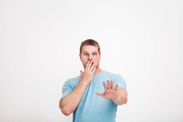 istock Stunned man portrait isolated on neutral background 1162934232