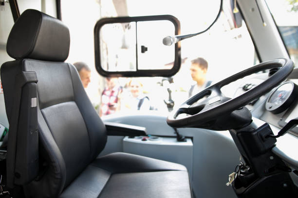 istock Seat and steering wheel. Bus driver 1162934249