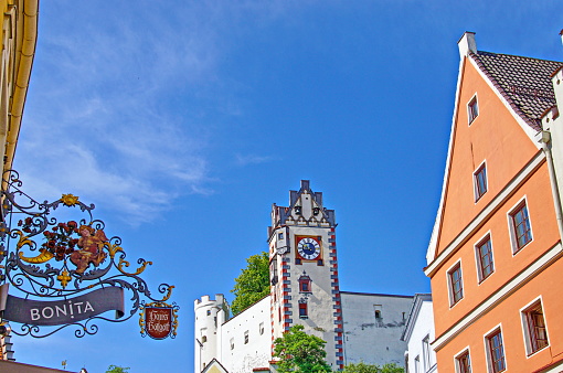 Füssen, Germany July 2019:  Füssen is really a colourful town located at the foot of the Alps, in Bavaria in the district of Ostallgäu on the famous Romantic Road (Romantische Straße) which is linking a number of picturesque towns and castles.