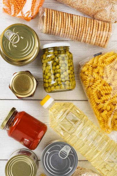 istock Various uncooked cereals, grains, pasta and canned food. 1162935451