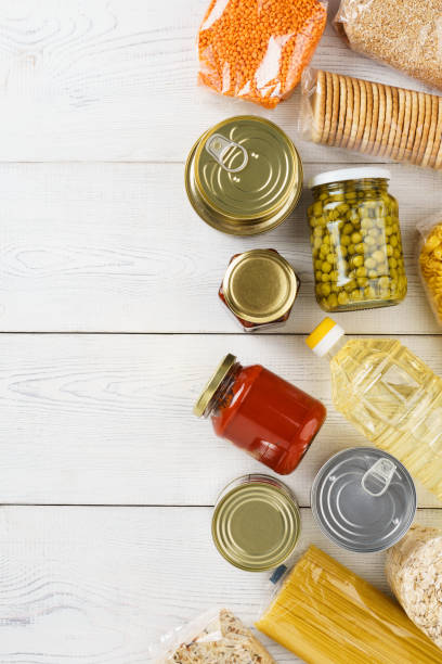 istock Various uncooked cereals, grains, pasta and canned food. 1162935767