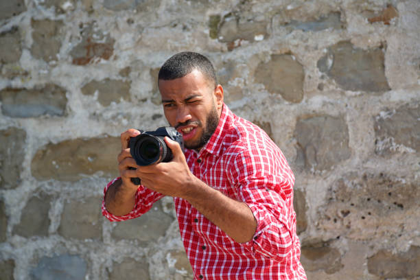 istock Photographer taking photos 1162938717