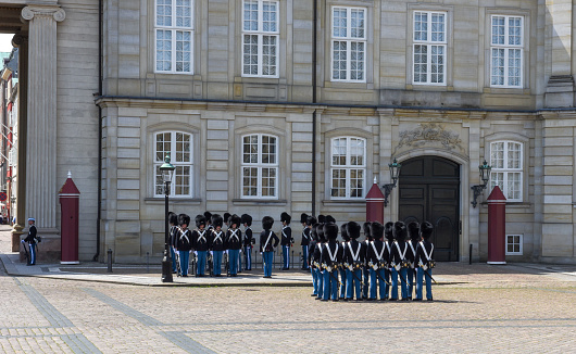 Copenhagen Denmark - 25 June 2019: changing of the guard at Amalienborg palace on town square in Copenhagen, Denmark
