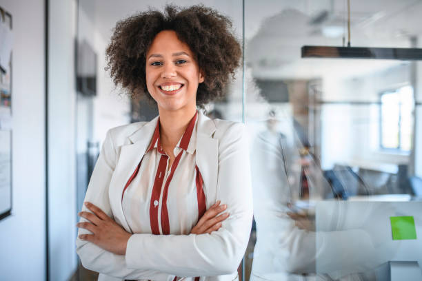 istock Confident Young Mixed Race Businesswoman in Modern Office 1162941402