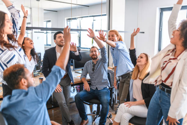 istock Motivated Businesspeople Putting Hands Together in Unity 1162941509