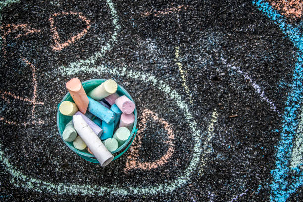 istock colorful chalk drawings on a sidewalk 1162944200
