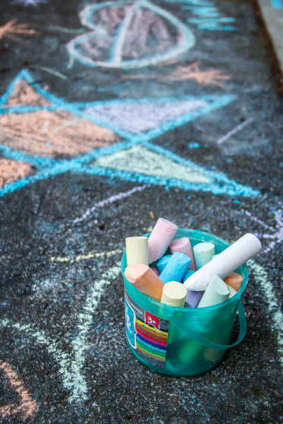 istock colorful chalk drawings on a sidewalk 1162944746