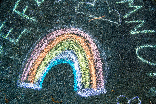 istock colorful chalk drawings on a sidewalk 1162944956