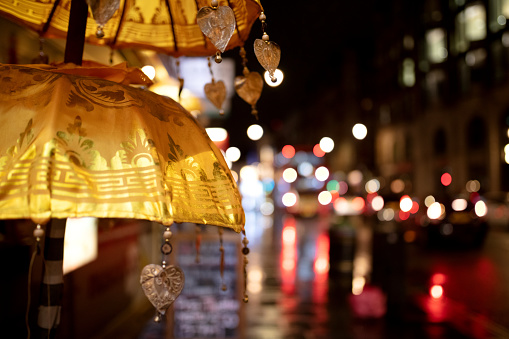 Yellov chinese lantern by night with bokeh in background, Chine Town London