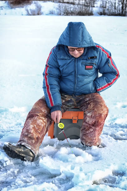 istock Lake Winter Fisherman 1162946782