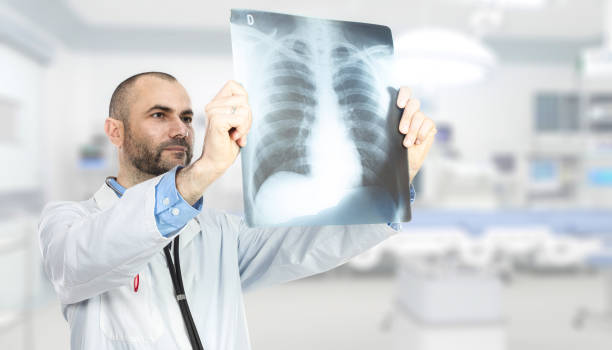 istock Doctor Examining X Ray At Hospital 1162947596