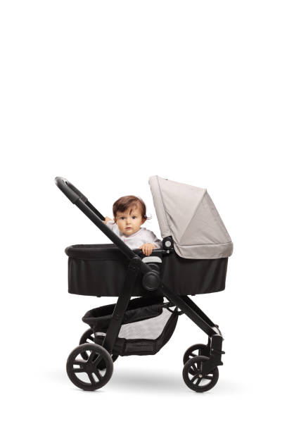 istock Cute baby sitting in a pram stroller 1162955959